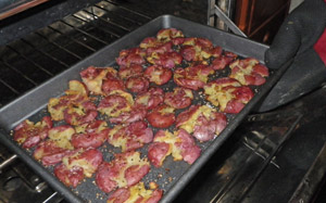 Potatoes emerging from the oven