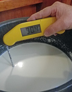 The milk mixture is warmed to 90 degrees.