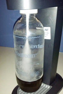 Adding carbonation to water. The Sodastream bottles have a fill line prominently marked on the bottles.