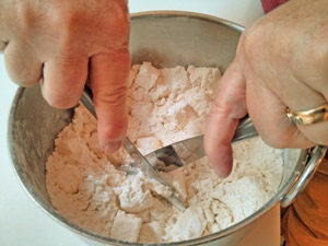 No food processor or pastry cutter? Use two knives to cut the shortening into the dry ingredients.